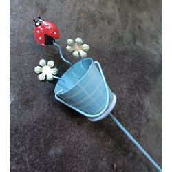 Spand med blomster p pind bl